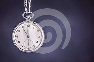 Vintage Pocket Watch on Dark Background. Deadline and Time Management Concept.