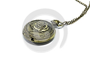 Vintage pocket watch on white