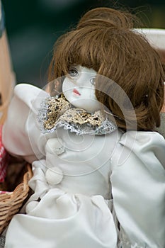 vintage porcelain doll at flea market in the street