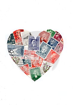 Vintage postage stamps from Norway in the shape of a heart.