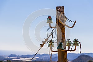 Vintage power lines on a wooden pole