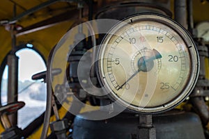 Vintage pressure gauge from an old steam engine