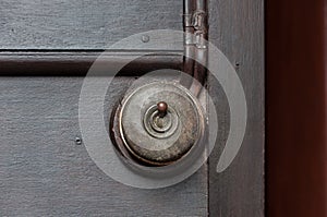 A Vintage put light switch on wooden interior wall