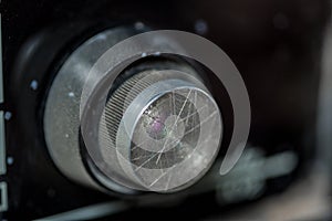 Vintage radio tuning knob close-up . blurred background. small focusing area, selective focus