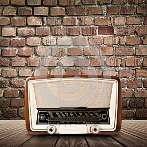 Vintage radio on wall background