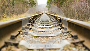 Vintage railroad tracks sepia color in grunge and retro style and old picture.