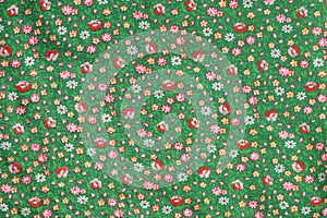 Vintage real fabric 1960s cotton emerald green with red roses and yellow flower pattern