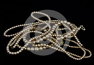 Vintage Real Pearls on Black Background