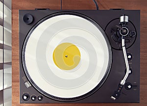 Vintage Record Turntable Player With White Vinyl Disk