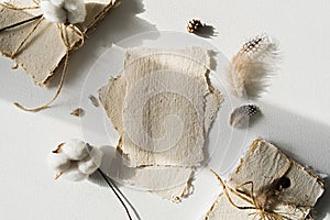 Vintage recycled handmade paper and dry flowers. Christmas Mockup for showcasing artwork and design. Minimal mockup of