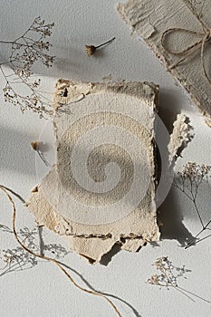 Vintage recycled handmade paper and dry flowers. Mockup for showcasing artwork and design. Minimal mockup of letterhead