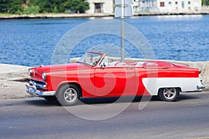 Vintage red American car at Havana, Cuba