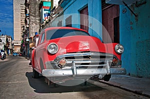 Vintage red car in Havana street
