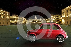 Vintage red car in the historic city of Trieste, Italy. Night