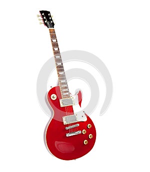 Vintage red electric guitar, isolated on white.