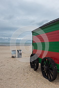 Vintage red and green striped beach cabin