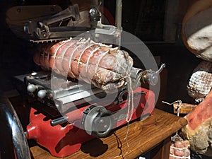 Vintage red ham slicer with big sausage