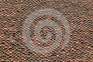 Vintage red roof terracotta tile. Old roof tiles background. Texture ancient. Red brown roof tiles