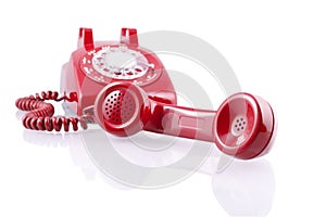 Vintage red rotary phone (with clipping path)