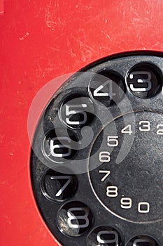Vintage red telephone close-up