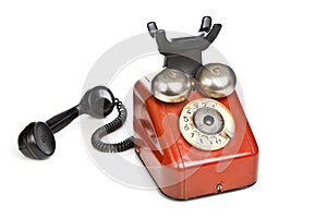 Vintage red telephone isolated on white background
