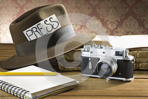 Vintage reporter fedora hat camera