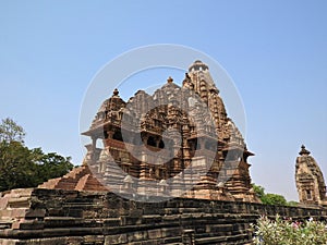 Vintage retro effect filtered hipster style image of famous indian Madhya Pradesh tourist landmark - Kandariya Mahadev Temple,