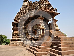 Vintage retro effect filtered hipster style image of famous indian Madhya Pradesh tourist landmark - Kandariya Mahadev Temple,