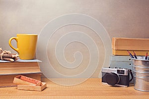 Vintage retro objects on wooden desk. Website hero image concept