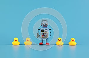 Vintage retro robot and Yellow Rubber Bath Ducks, leadership