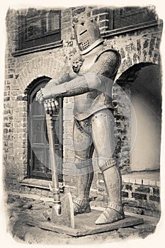Vintage retro stylized image of medieval knight with axe