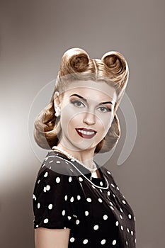 Vintage. Retro Woman in Stylish Polka Dot Dress Portrait - Pin Up