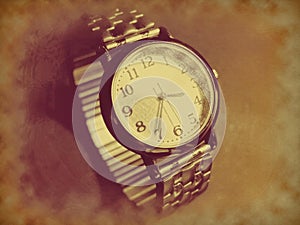 Vintage retro wrist watch in antique sepia color old version