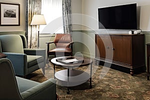 vintage room with classic furniture and modern conveniences, such as a flatscreen tv