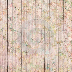 Vintage roses on wood background in pinks