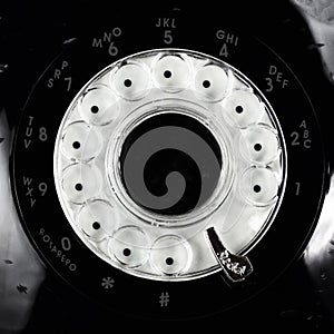 Vintage rotary dial phone in close up view