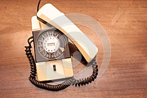 Vintage rotary dial telephone.