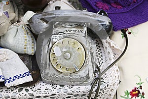 Vintage rotary dial telephone on one of the souvenir markets in