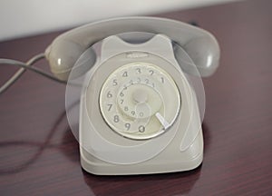 Vintage rotary phone grey front dull