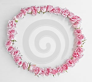 Vintage round frame of pink roses