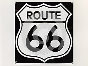 Vintage Route 66 sign on an off white background