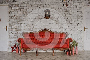 Vintage royal red sofa in a room