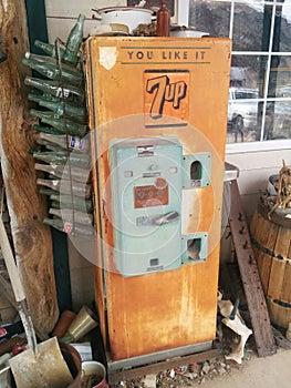 Vintage, rusted 7Up vending machine