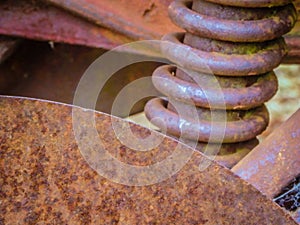 Vintage rusty tiller parts close-up