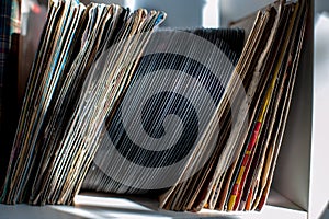 Vintage 45s vinyl row on house shelf