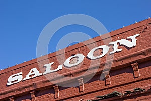 Vintage saloon letters on a red brick building in Nevada City