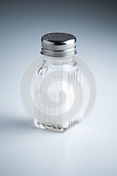 Vintage Salt Shaker on White Background with Shadows