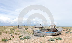 Vintage scene with old worn boats seen ashore