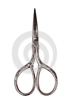 Vintage scissors at white background