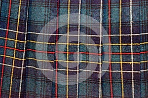 Vintage Scottish tartan patterned wool kilt worn by clans